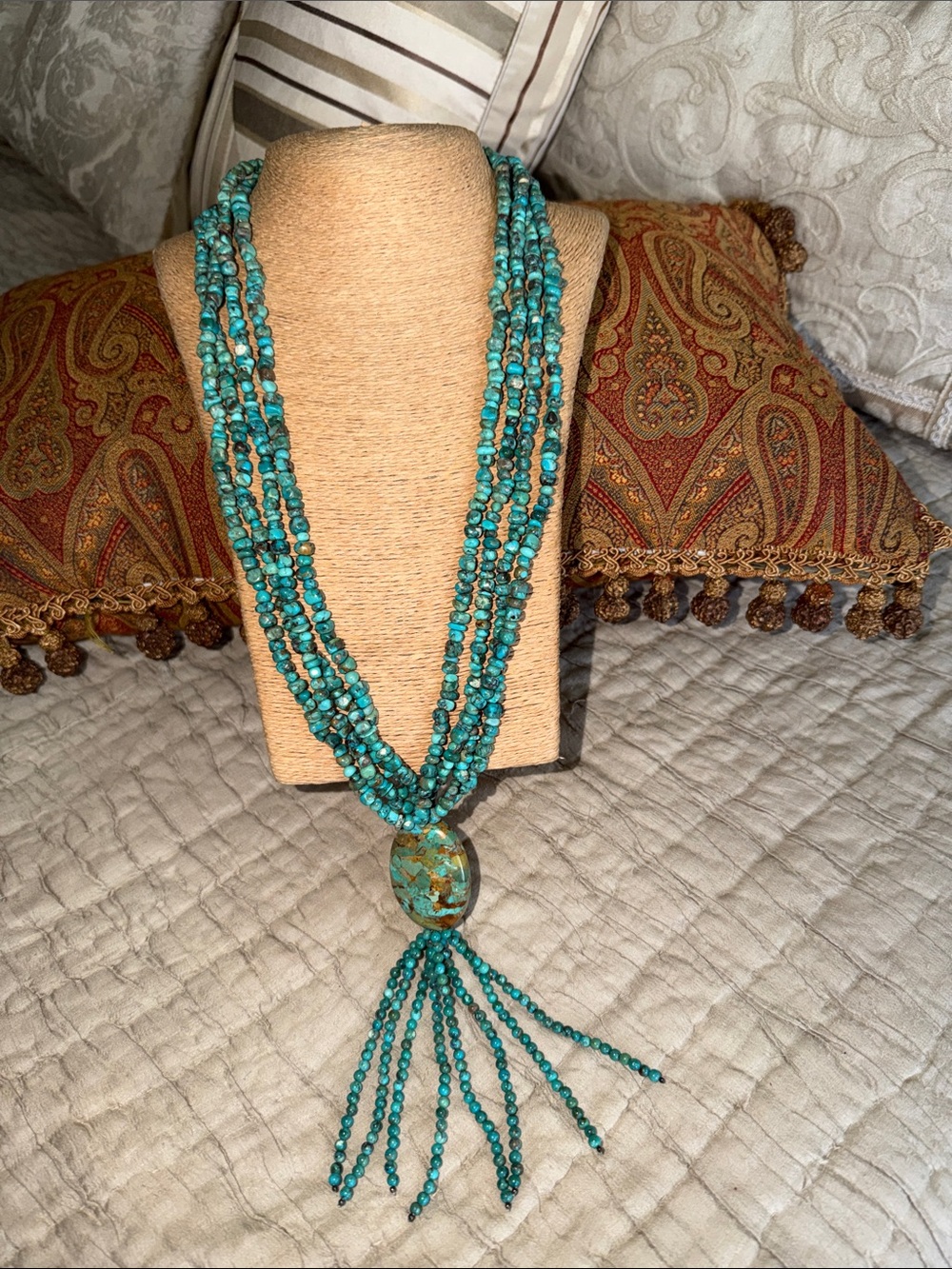 Turquoise multi strand necklace with large focal turquoise pendant tasseled